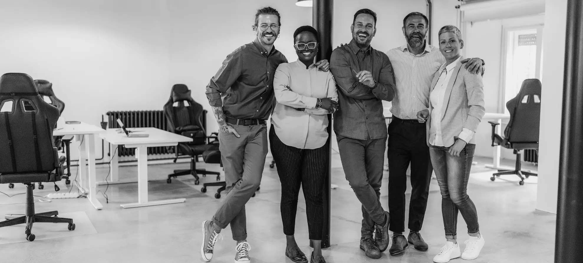 Meeting of smiling coworkers posed for a group photo